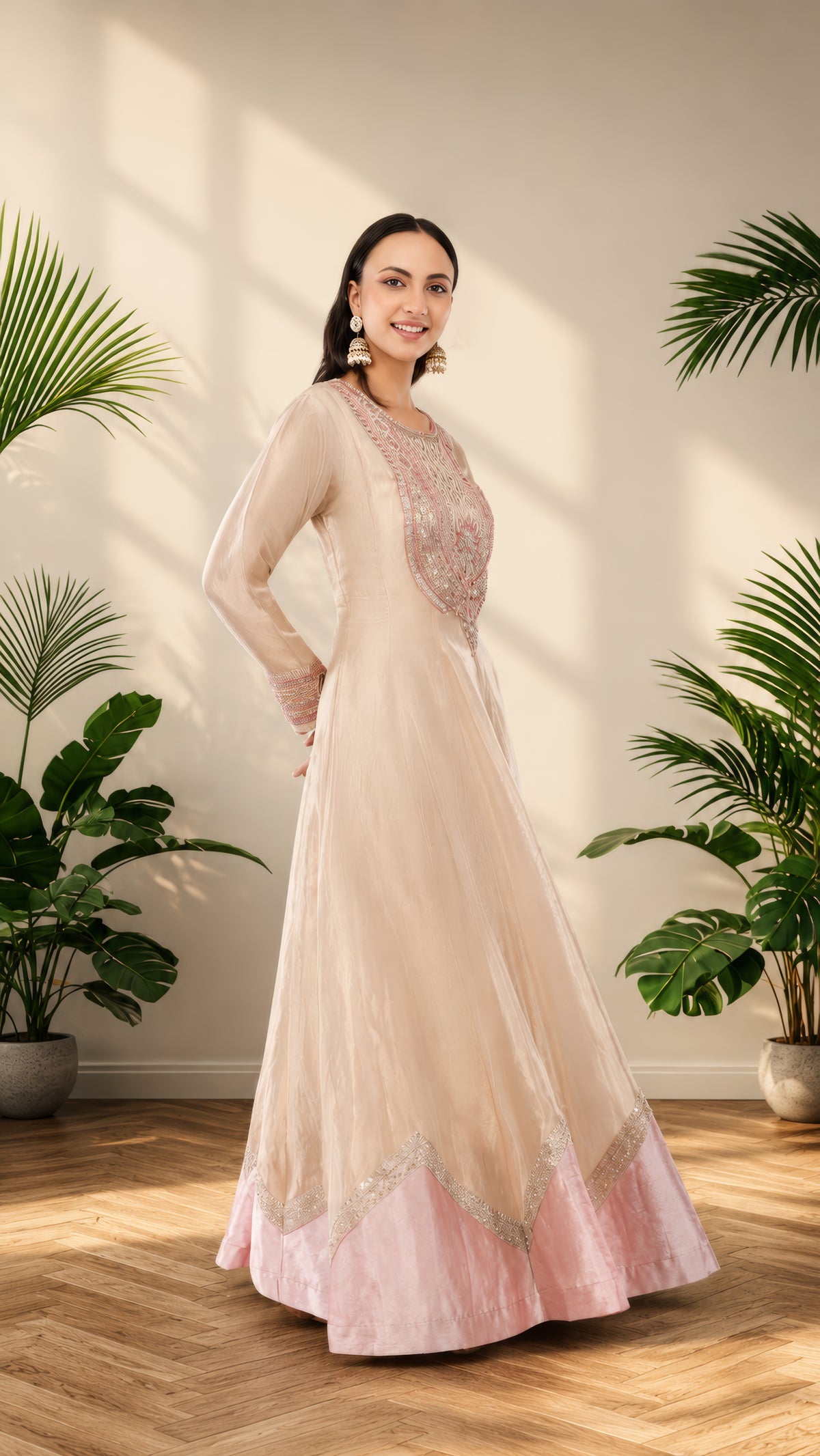 Elegant Jiraaf silk Anarkali with a lustrous finish, paired with a Tissue silk dupatta and intricate hand threadwork