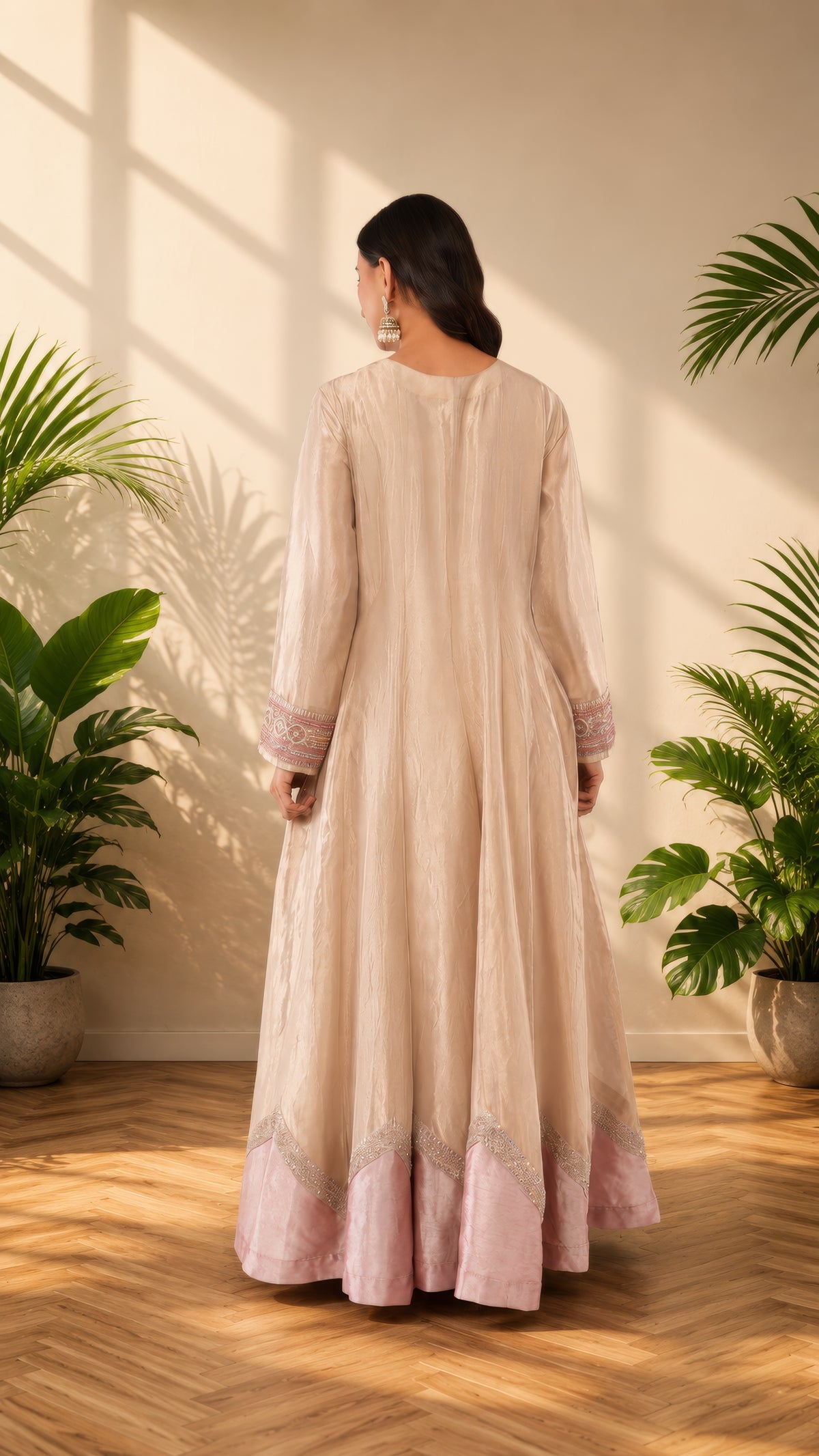 Elegant Jiraaf silk Anarkali with a lustrous finish, paired with a Tissue silk dupatta and intricate hand threadwork