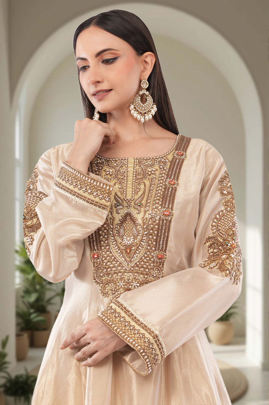 Elegant Jiraaf silk Anarkali with a lustrous finish, paired with a Tissue silk dupatta and intricate hand threadwork