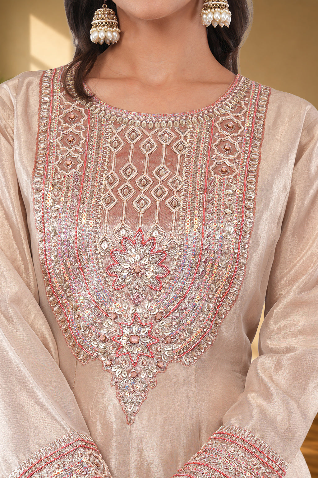 Elegant Jiraaf silk Anarkali with a lustrous finish, paired with a Tissue silk dupatta and intricate hand threadwork