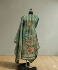 Green Banarasi Anarkali suit with floral embroidery and dupatta on mannequin