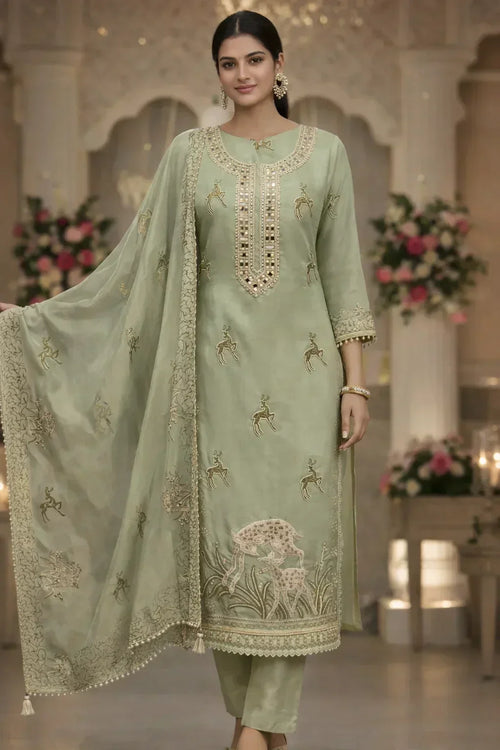 Elegant sage green salwar kameez with gold embroidery and matching dupatta, ideal for festive occasions.
