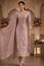 Elegant mauve salwar kameez with floral embroidery, tassel accents and matching dupatta