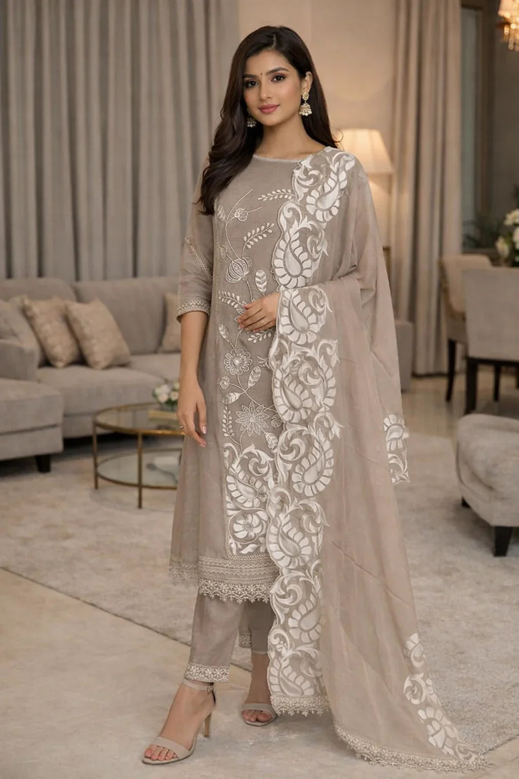 Woman in beige embroidered Anarkali suit with dupatta, luxury ethnic wear for festive occasions