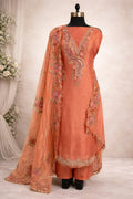 Peach Banarasi Anarkali suit with floral embroidery and matching dupatta on mannequin