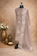 Beige embroidered organza dupatta with floral motifs displayed on a mannequin, luxury ethnic wear