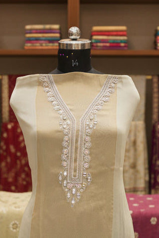 Top and dupatta Tulfi half and half, bottom Upada silk, thread embroidery and hand work