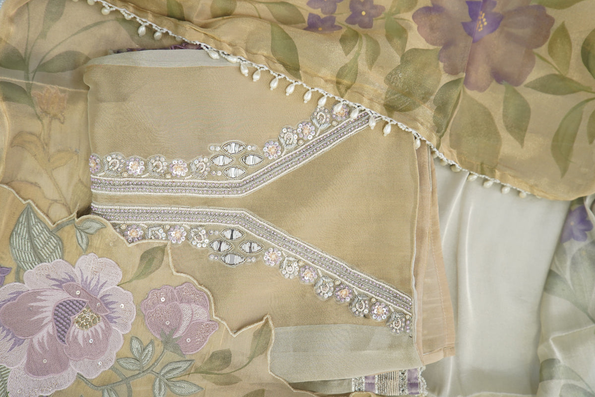 Top and dupatta Tulfi half and half, bottom Upada silk, thread embroidery and hand work