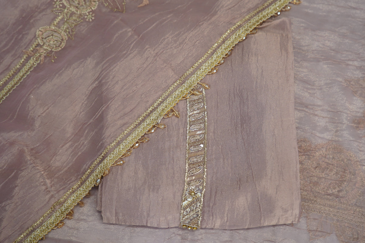 Bronze tissue top and dupatta, bottom Upada silk, handwork with multi thread and laces