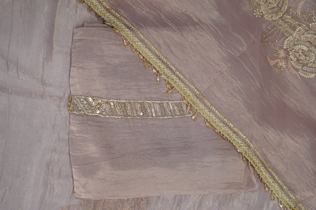 Bronze tissue top and dupatta, bottom Upada silk, handwork with multi thread and laces