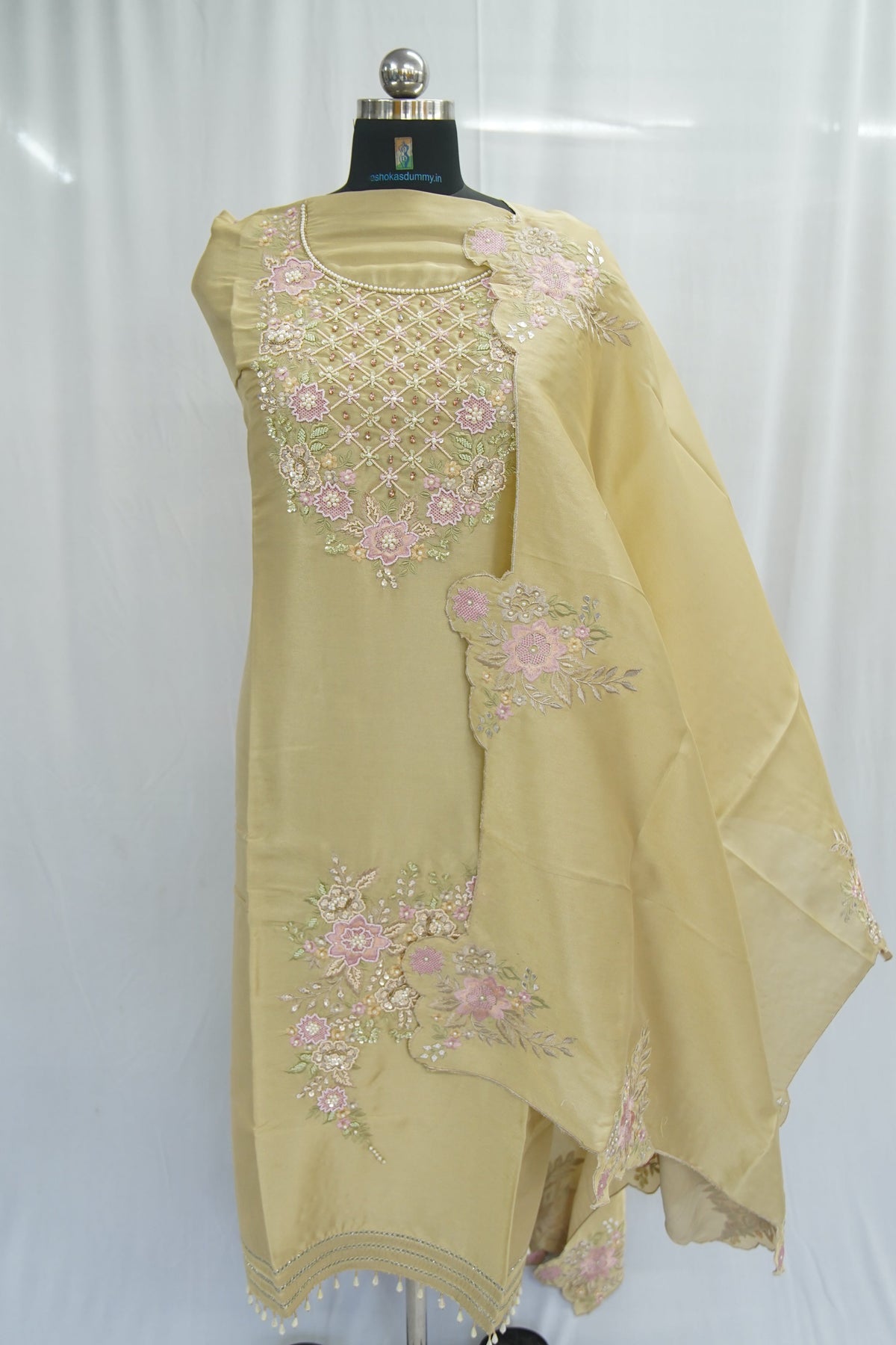 Tatwam silk top and dupatta, bottom Upada silk, thread and hand work with fancy cutwork duptta
