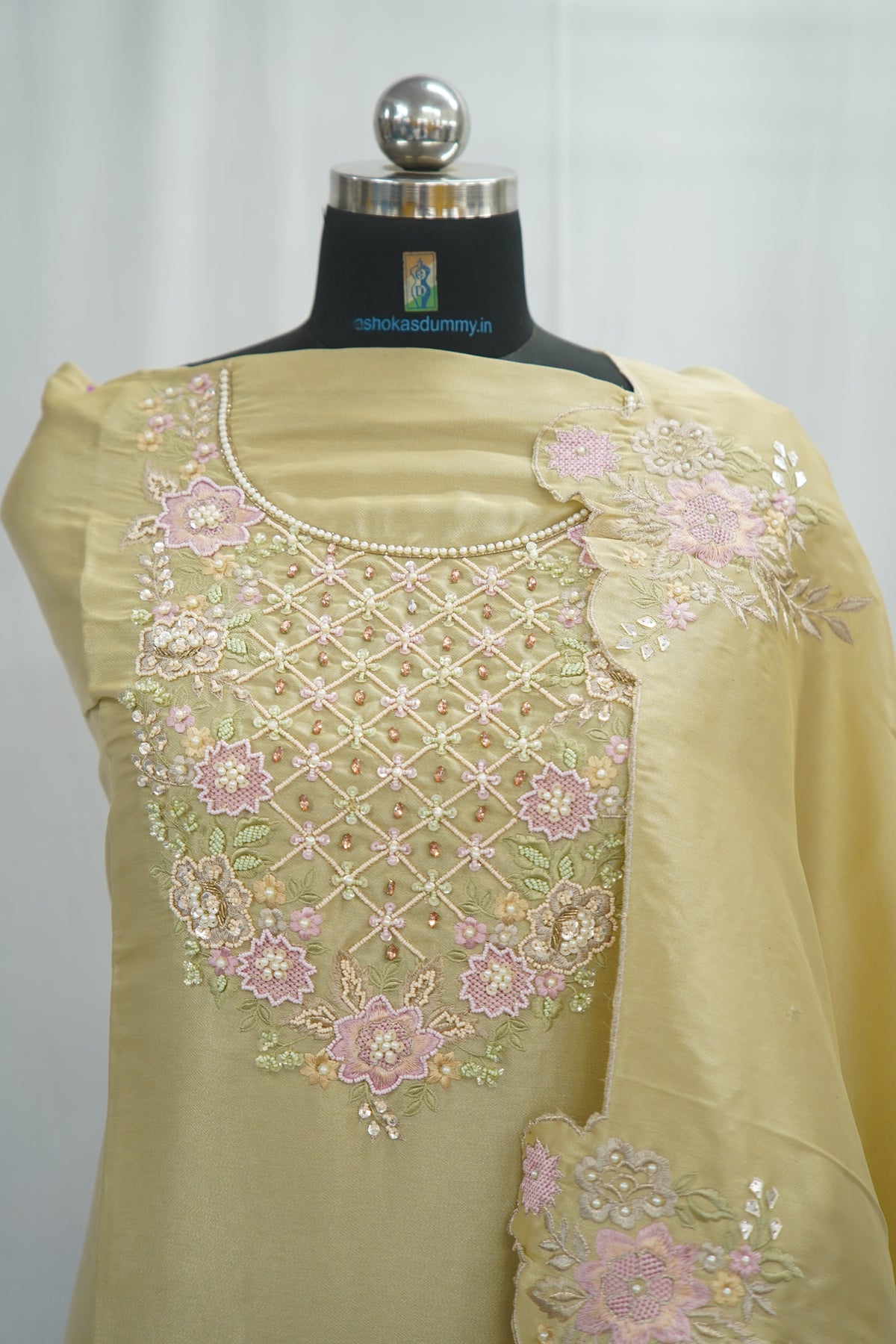 Tatwam silk top and dupatta, bottom Upada silk, thread and hand work with fancy cutwork duptta