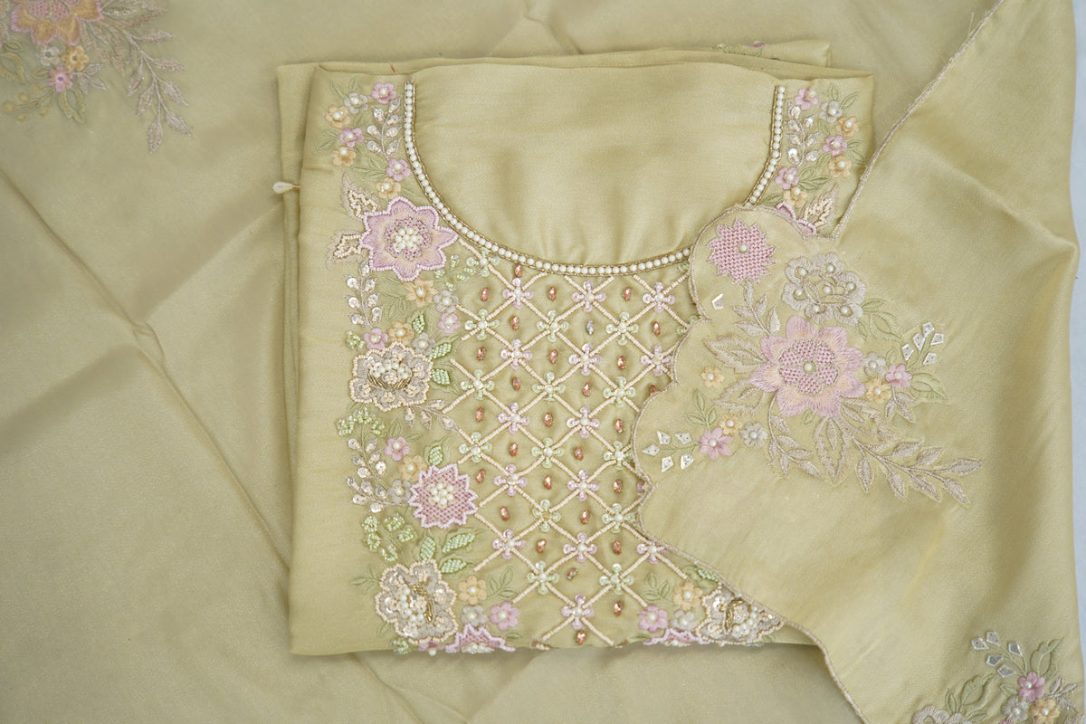 Tatwam silk top and dupatta, bottom Upada silk, thread and hand work with fancy cutwork duptta