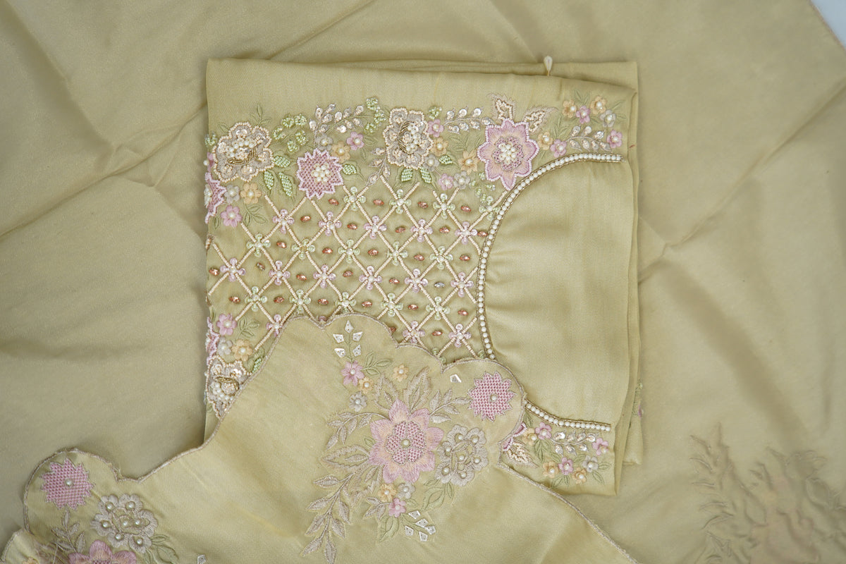 Tatwam silk top and dupatta, bottom Upada silk, thread and hand work with fancy cutwork duptta