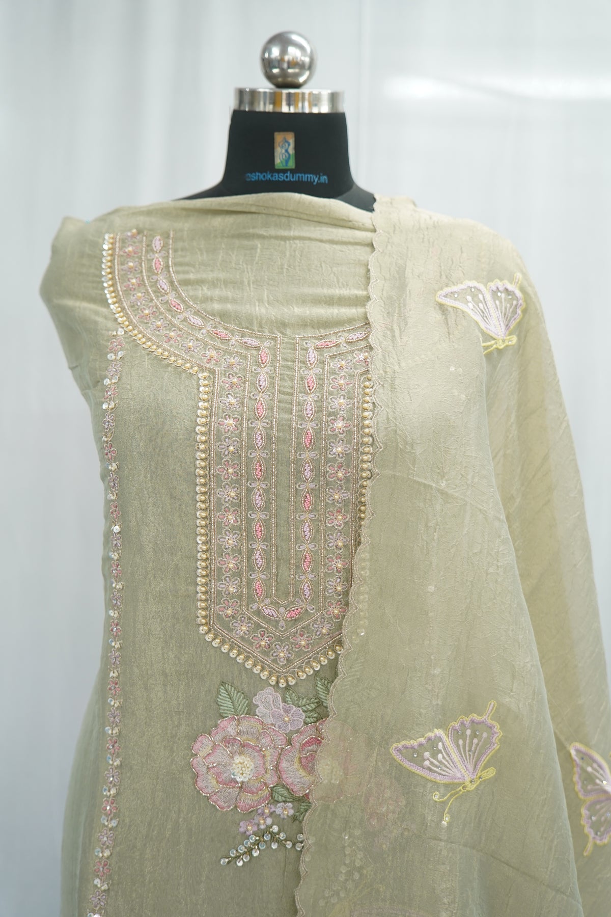 Bronze tissue top and dupatta, bottom Upada silk, handwork with multi thread and beads laces