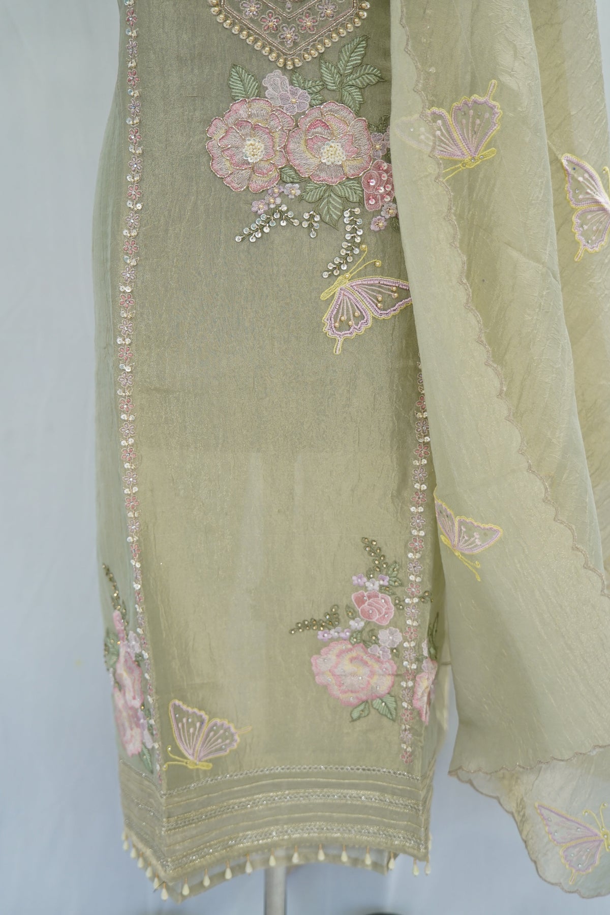 Bronze tissue top and dupatta, bottom Upada silk, handwork with multi thread and beads laces