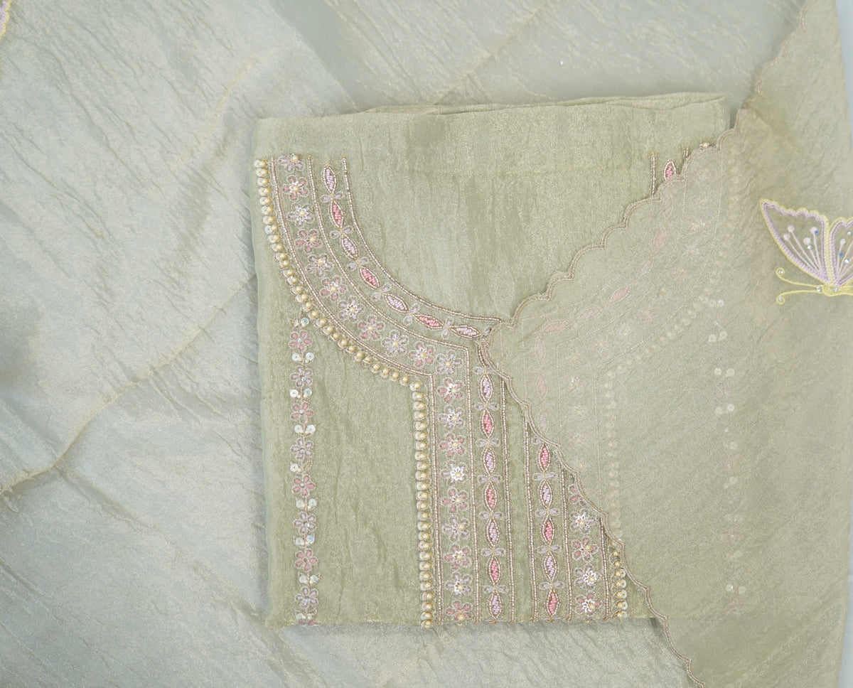 Bronze tissue top and dupatta, bottom Upada silk, handwork with multi thread and beads laces