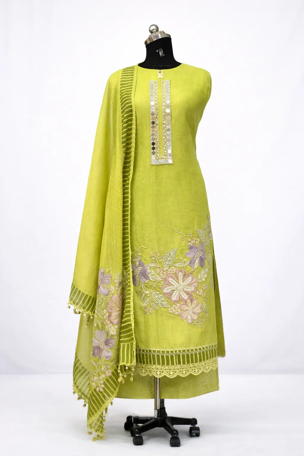 Lime green ethnic suit with mirror work neckline, floral embroidery, and matching dupatta