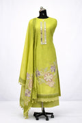 Lime green ethnic suit with mirror work neckline, floral embroidery, and matching dupatta