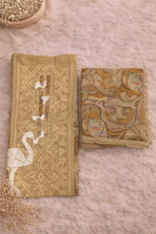 Embroidered ethnic fabric set with geometric and floral motifs in neutral tones, flat lay