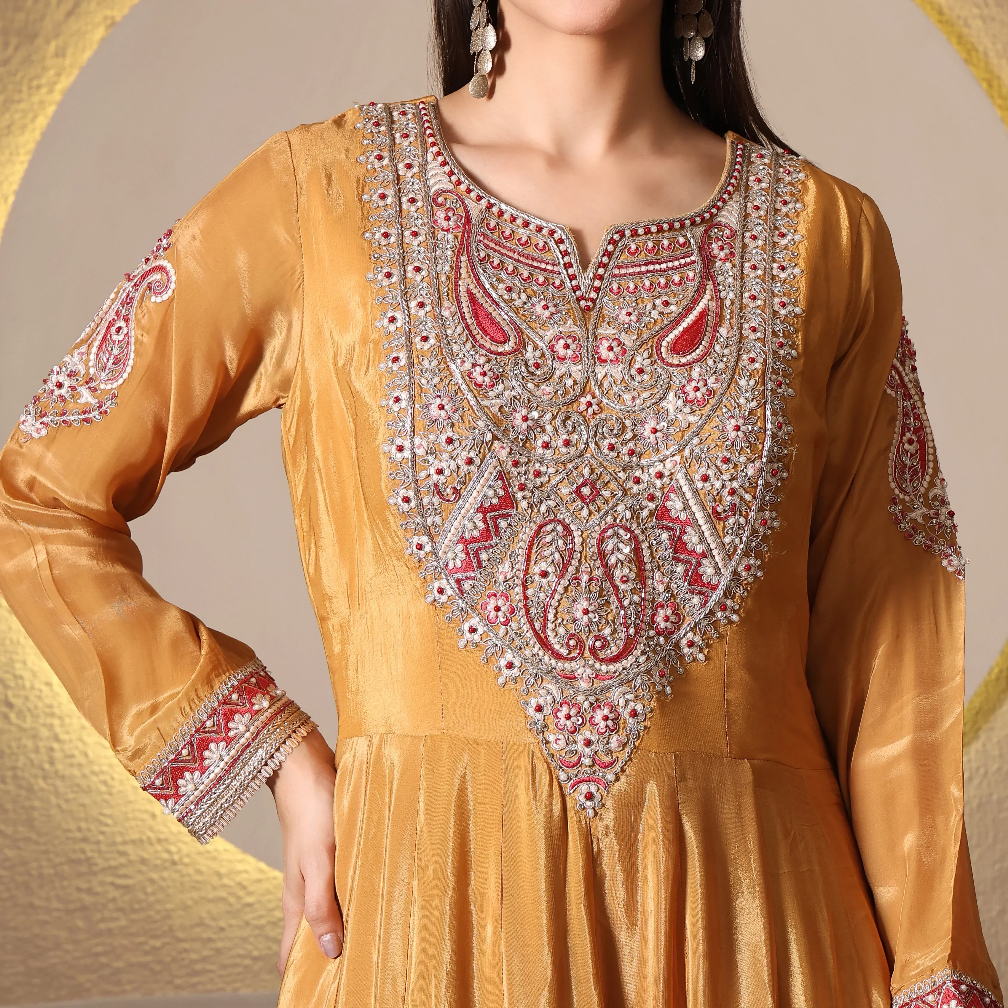 Gold Banarasi Anarkali suit with intricate red and silver embroidery, long sleeves