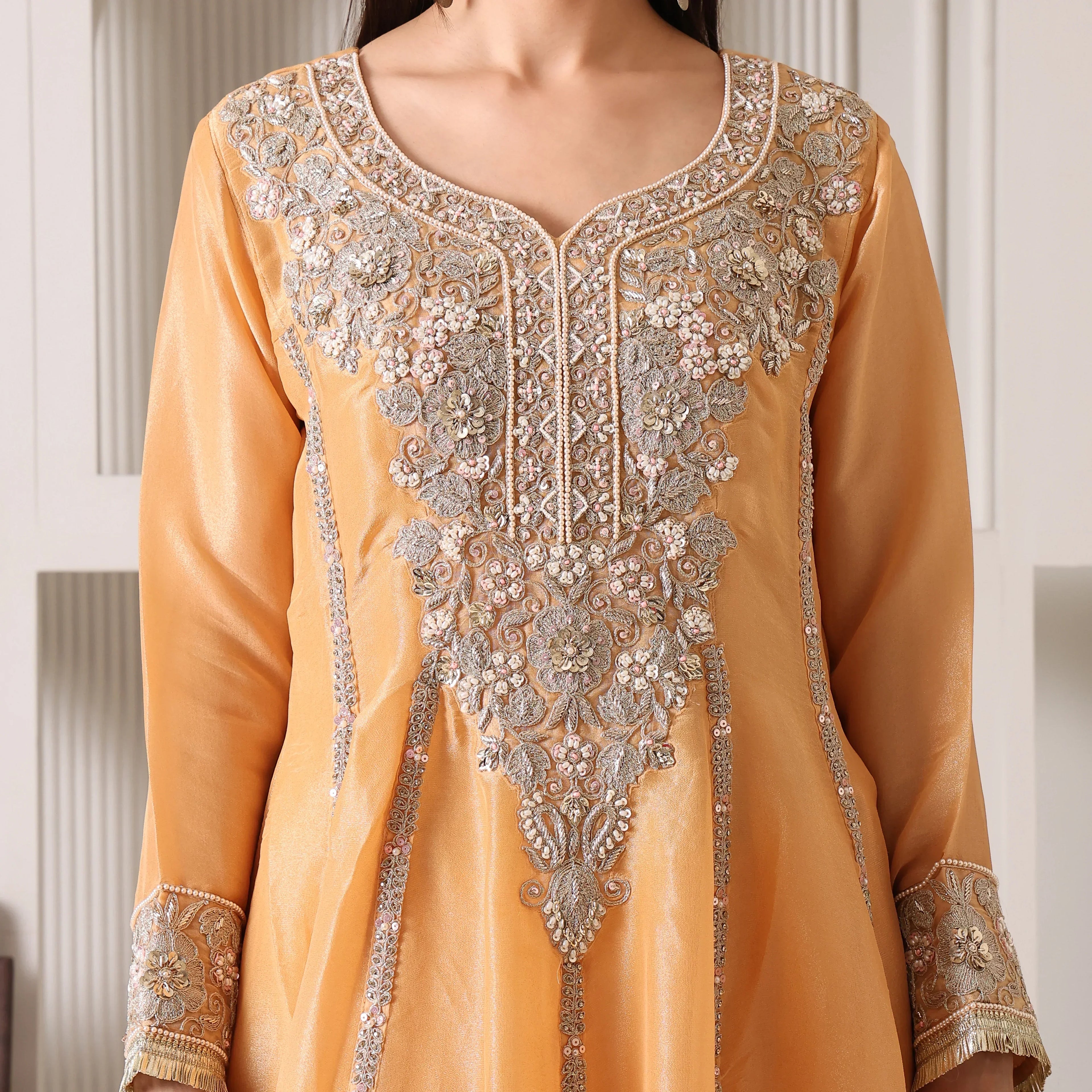 Gold Banarasi Anarkali suit with silver floral embroidery and long sleeves, festive ethnic wear
