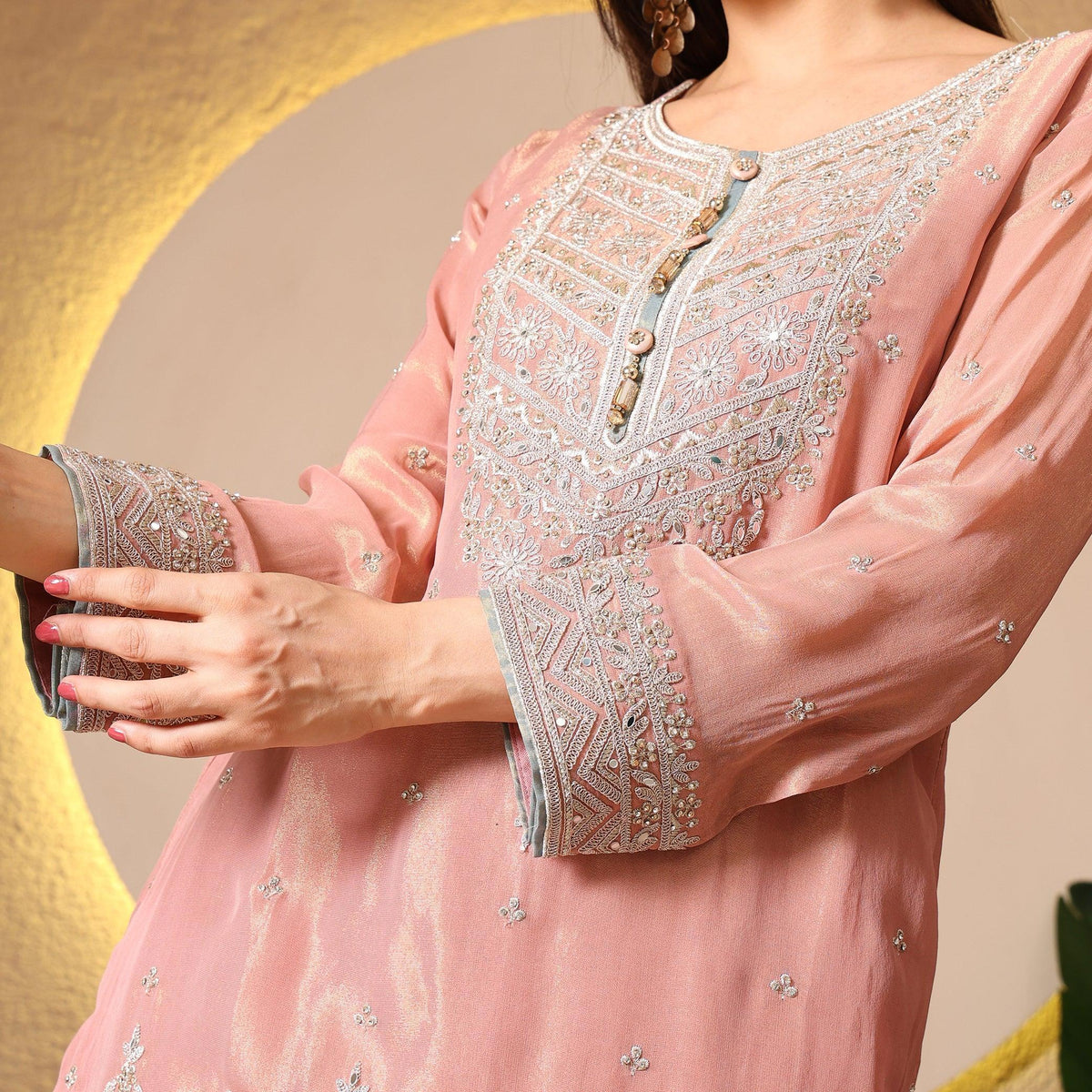 Peach embroidered anarkali suit with intricate silver thread and sequin work, festive ethnic wear