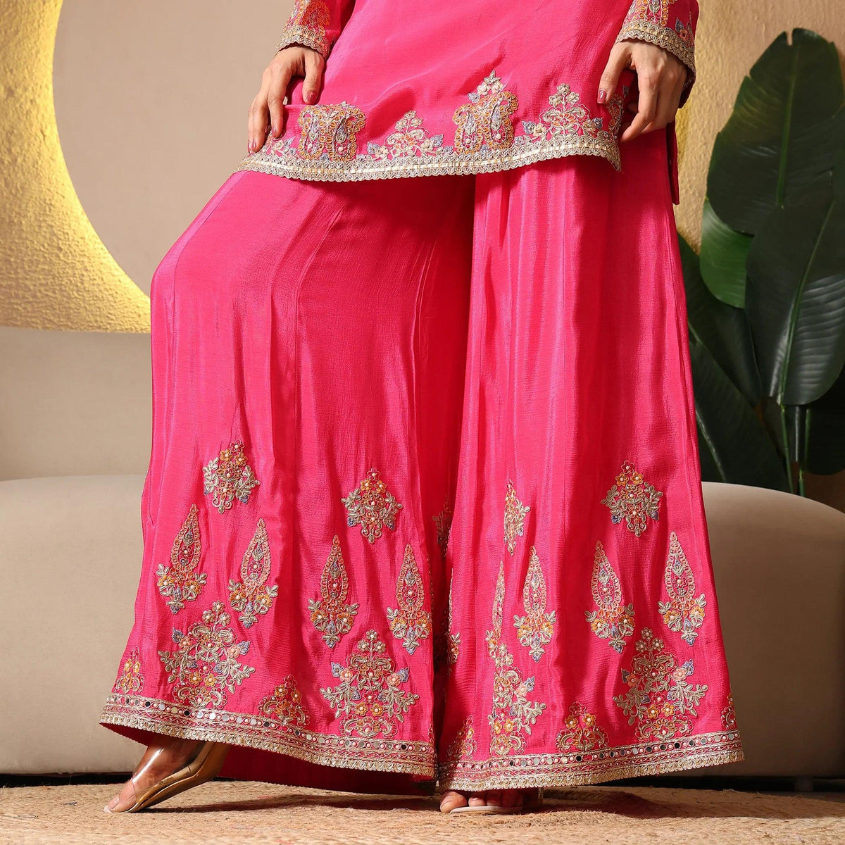 Pink ethnic palazzo suit with gold embroidery, ideal for festive or wedding wear