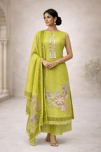 Woman wearing lime green ethnic suit with floral embroidery and matching dupatta, ideal for festive occasions