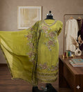 Olive green Banarasi Anarkali suit with floral embroidery on mannequin, elegant ethnic wear