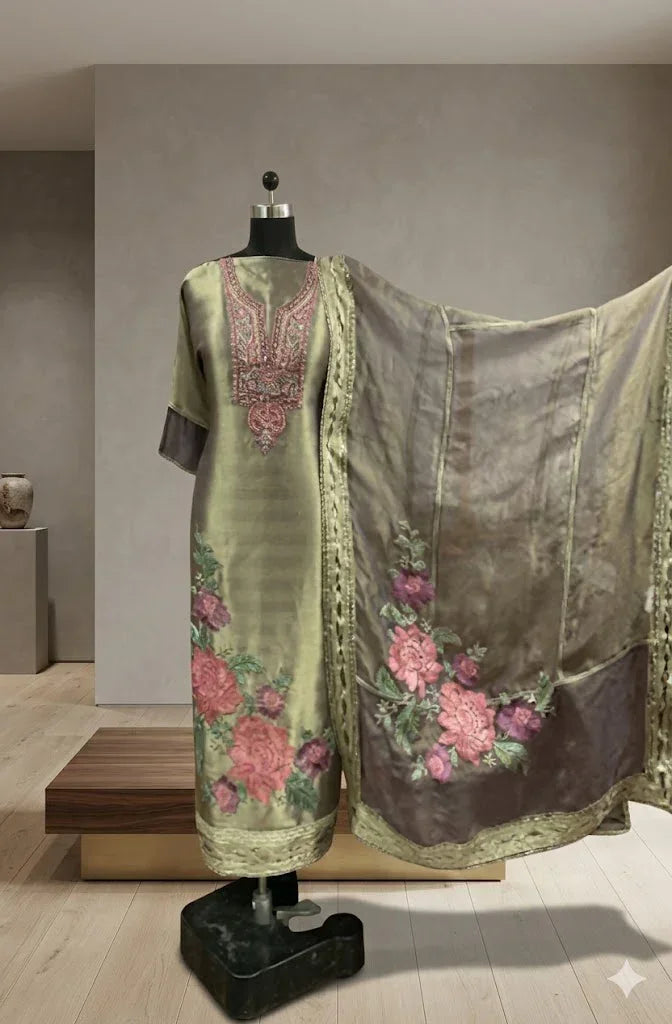 Olive green Banarasi Anarkali suit with floral embroidery and matching dupatta on mannequin