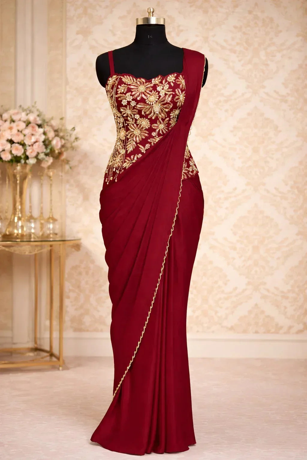 Maroon designer saree gown with gold embroidery on bodice, sleeveless, festive ethnic wear