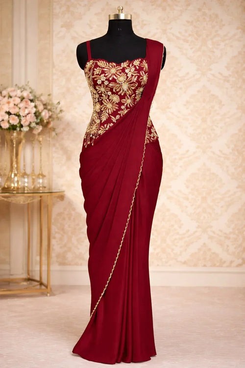 Maroon designer saree gown with gold embroidery on bodice, sleeveless, festive ethnic wear