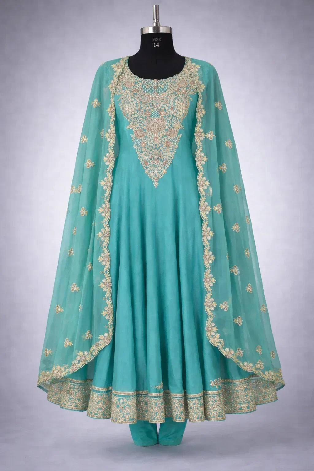 Aqua blue Banarasi Anarkali suit with gold embroidered dupatta and intricate detailing