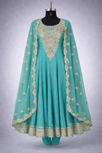 Aqua blue Banarasi Anarkali suit with gold embroidered dupatta and intricate detailing