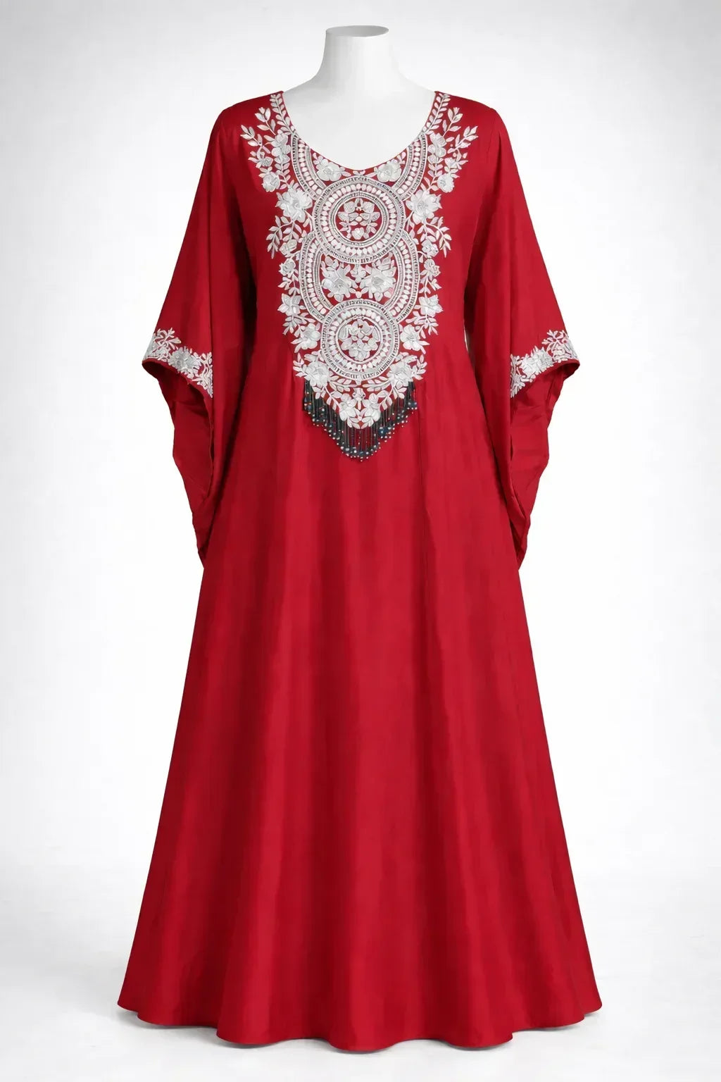 Red ethnic Anarkali gown with intricate white floral embroidery and beaded detailing