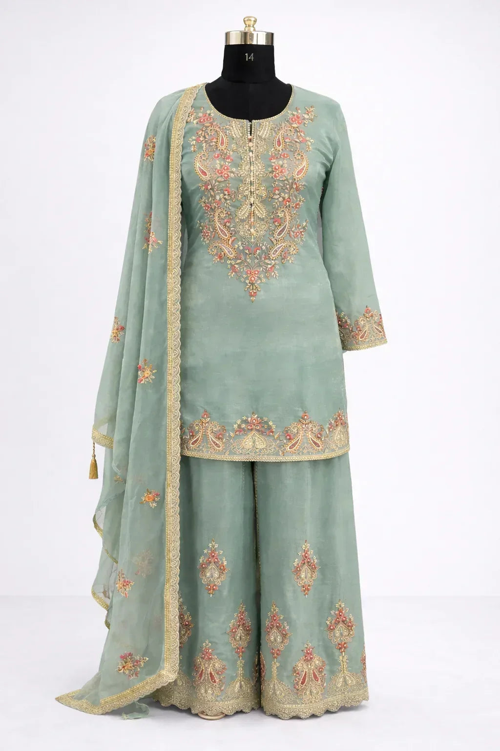 Sage green embroidered ethnic three-piece suit with dupatta for women, displayed on mannequin