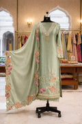 Sage green ethnic Anarkali suit with floral embroidery and dupatta, displayed on mannequin