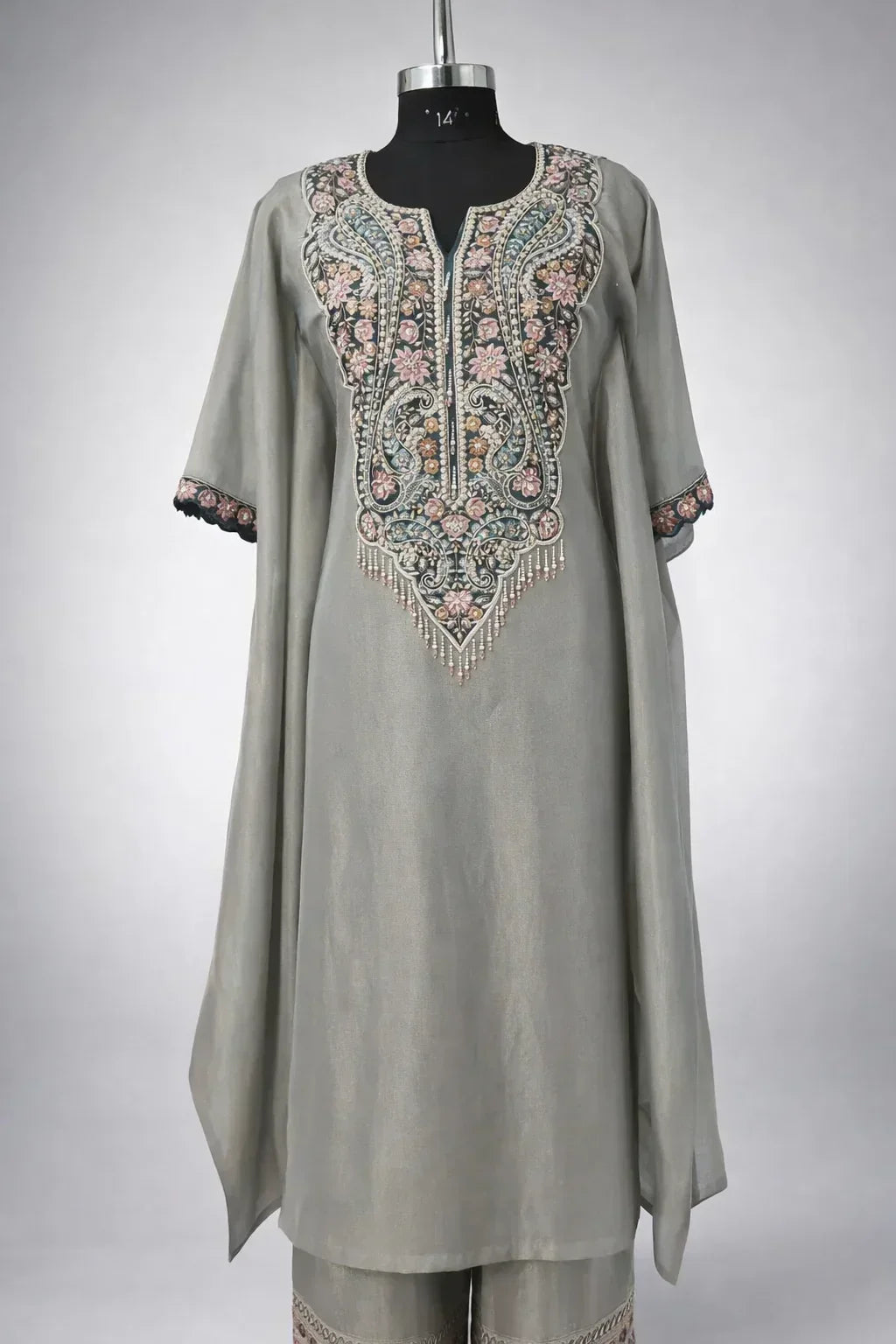 Grey ethnic kurta set with intricate floral embroidery, suitable for weddings and festive occasions