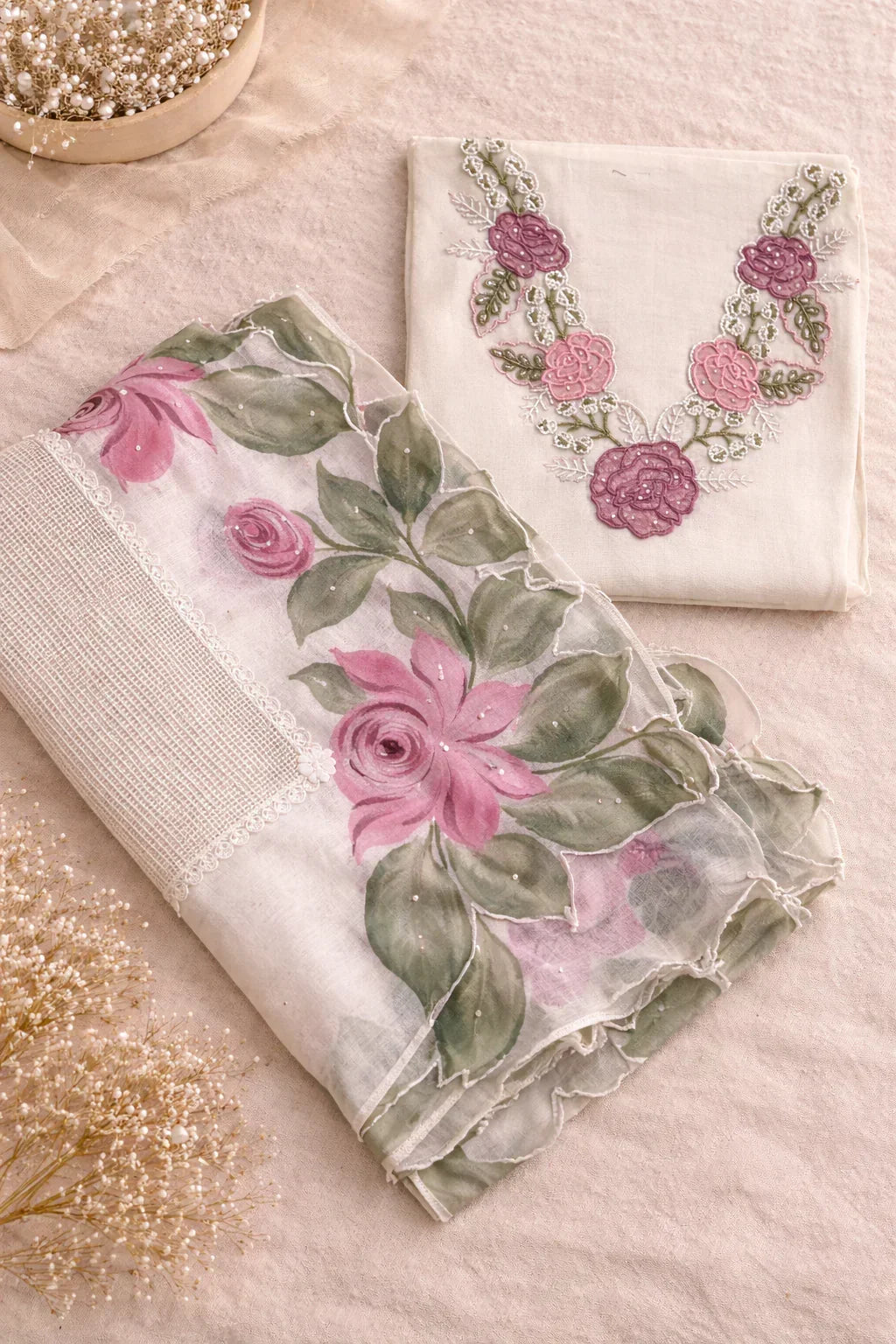 Floral organza fabric with pink and purple embroidered flowers, traditional ethnic wear set