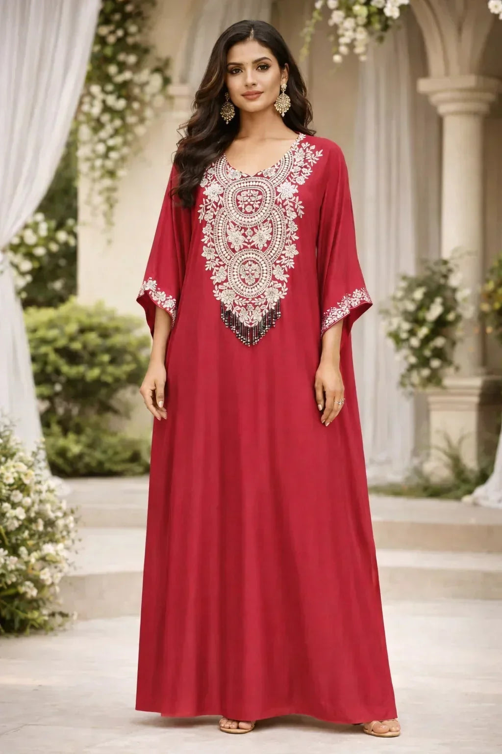 Woman in maroon ethnic Anarkali dress with intricate white embroidery, outdoor setting