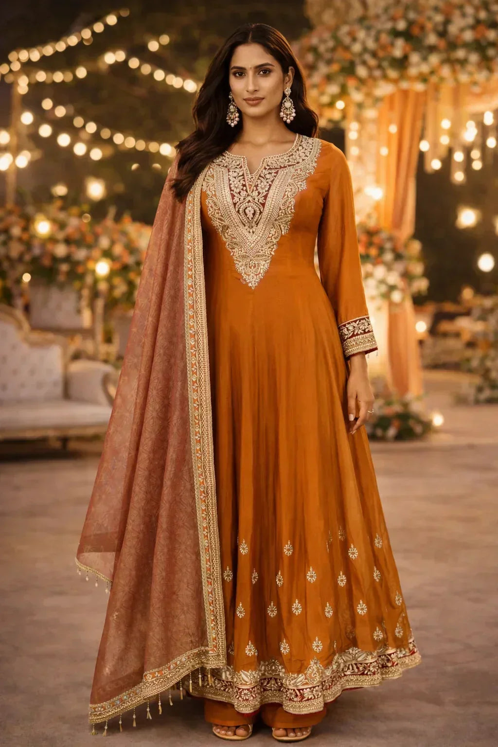 Woman in an embroidered Banarasi Anarkali suit with dupatta at a festive evening event